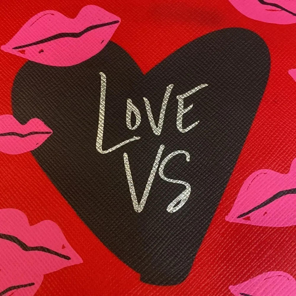 Red coated canvas Victoria’s Secret large wristlet make up bag